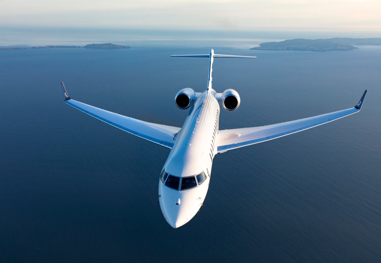 Bombardier Global 7500 flying over water